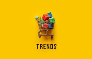 Yellow Background with Shopping Cart and Black Trends Text